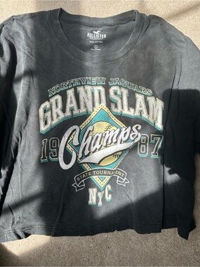 Hollister Black 'Grand Slam Champs' Graphic Tee with Teal and Yellow Accents